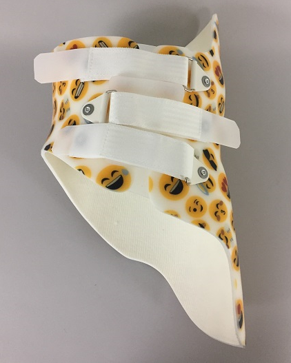 Scoliosis back brace with smiley face design